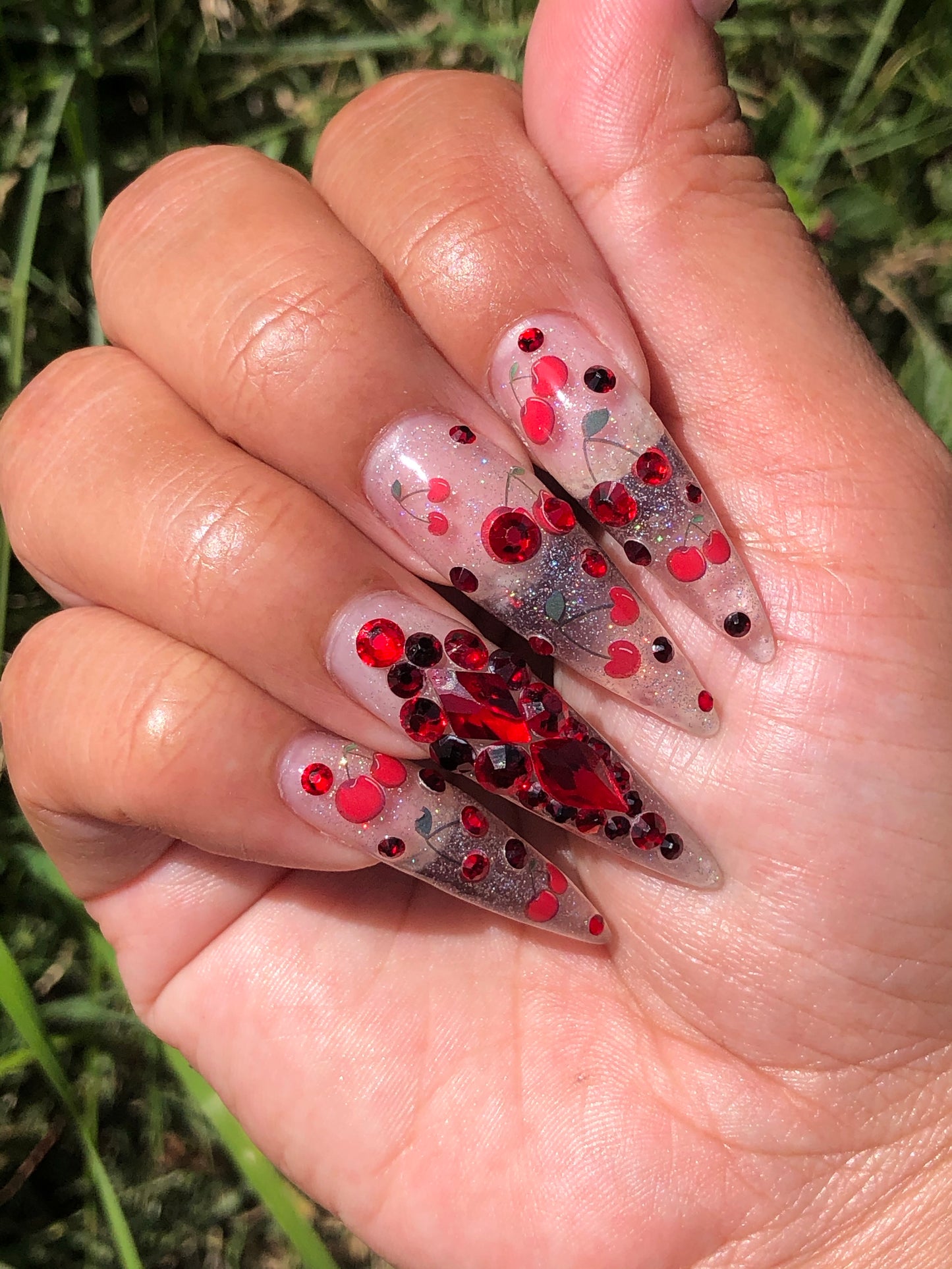 cherry nail art with glitter and gems