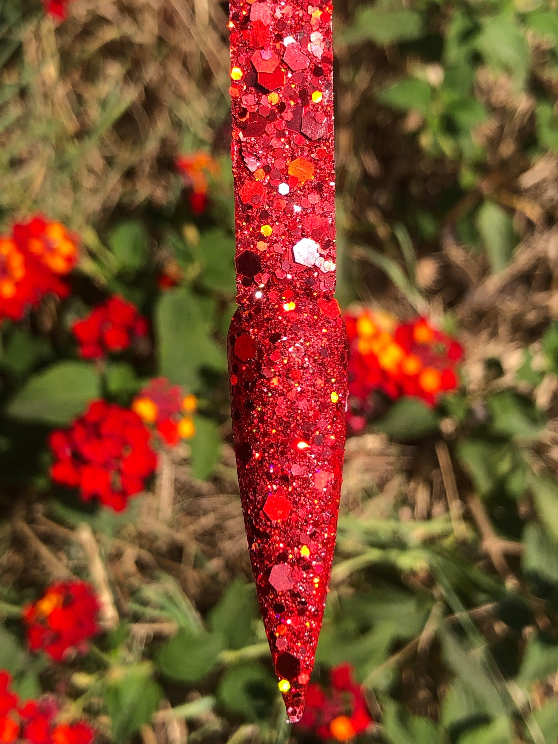 red nail art glitter