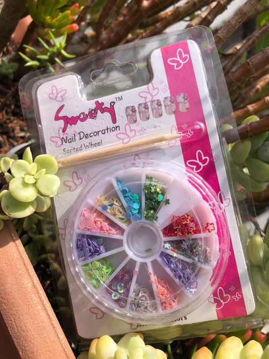 assortment of colored glitter for nail art