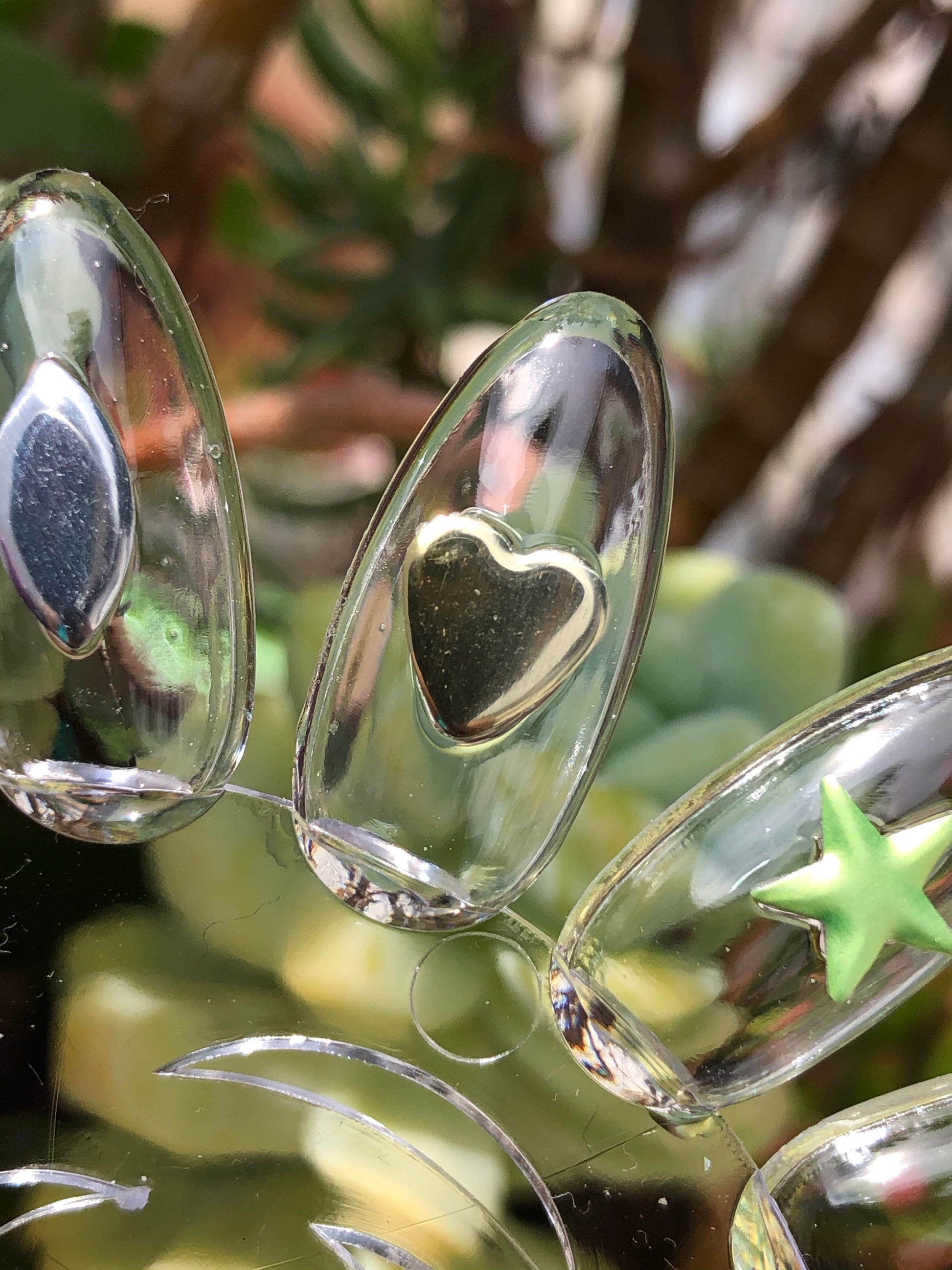 oval, heart, and star nail studs