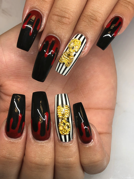 gold ribcage nail charm halloween manicure