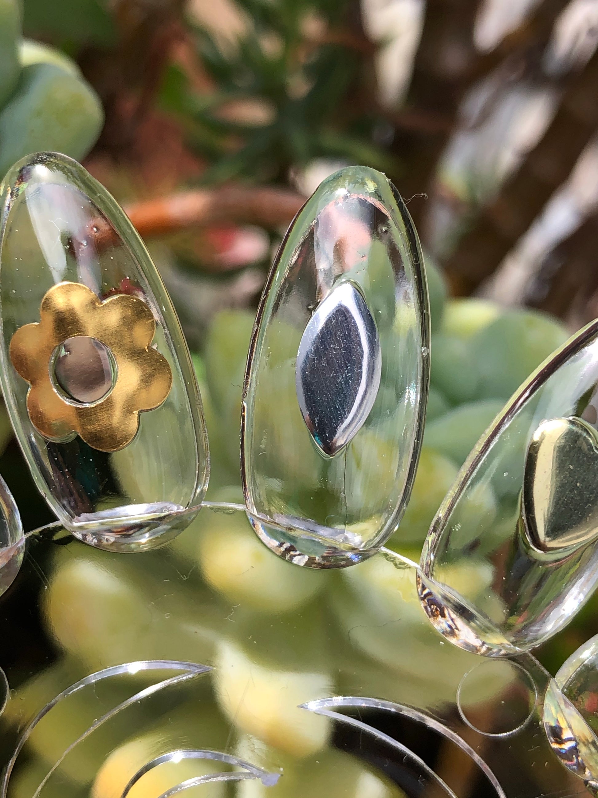 flower, oval, and heart nail studs